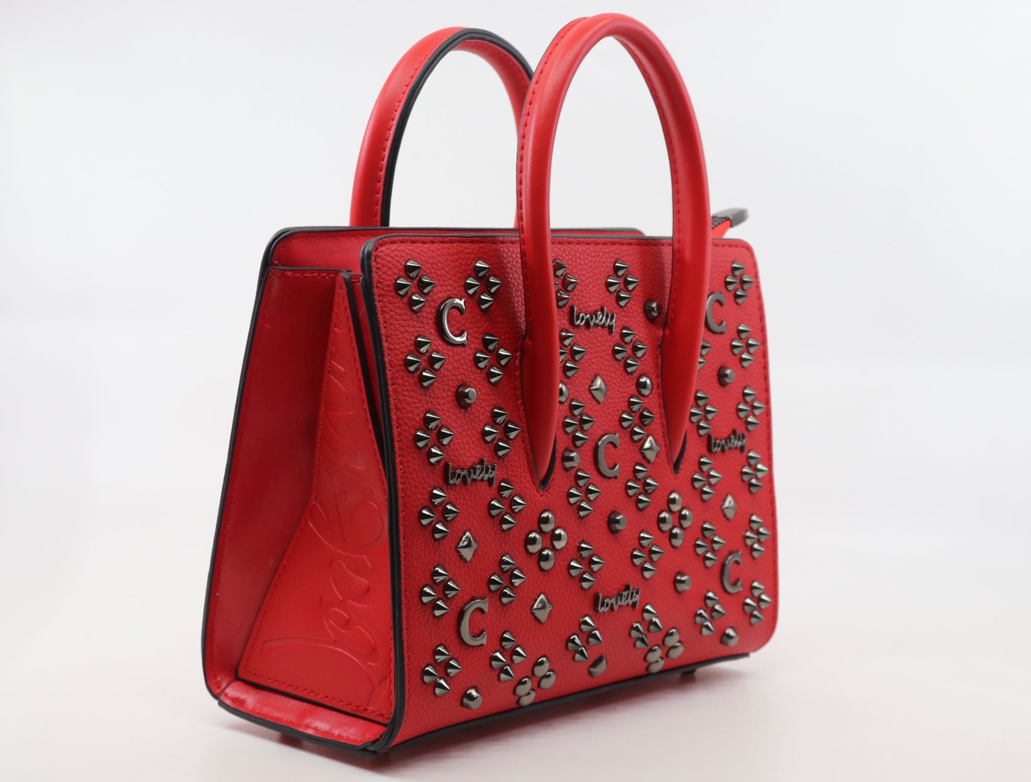 Leather bag embellished with metal studs (SB51)