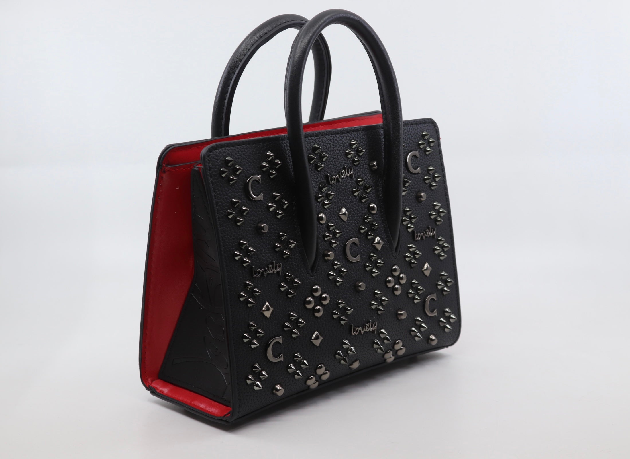 Leather bag embellished with metal studs (SB51)